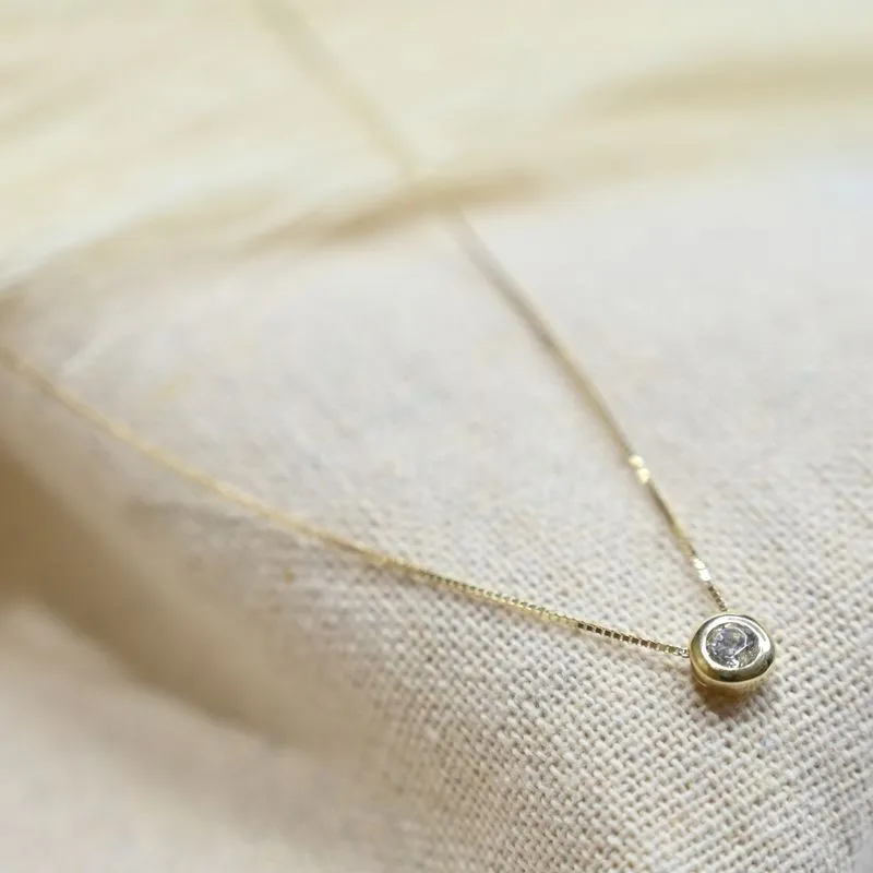 14k gold choker necklace with small white cz