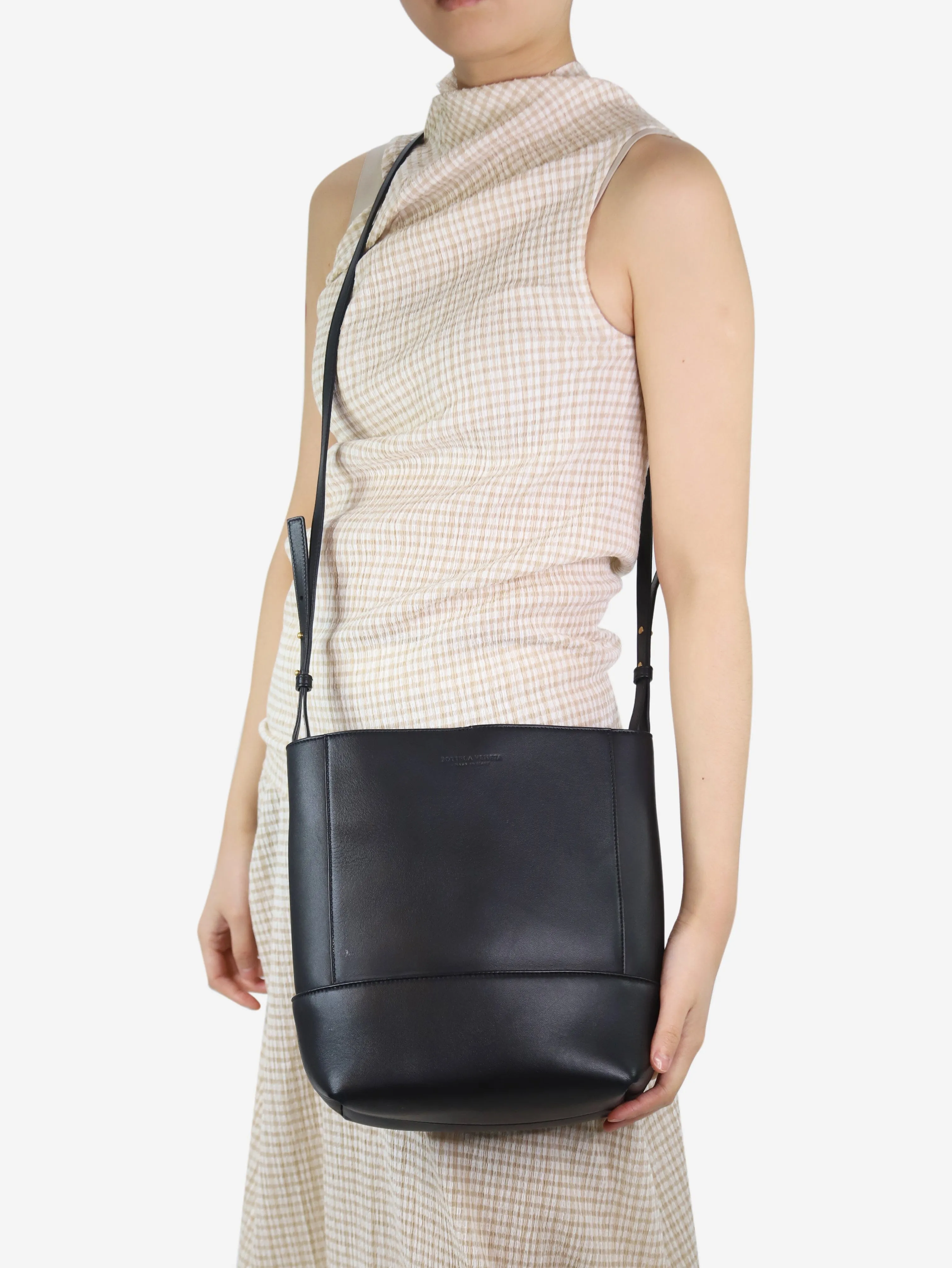 Black leather cross-body bucket bag